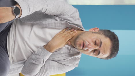 Vertical-video-of-Sick-man-coughing.